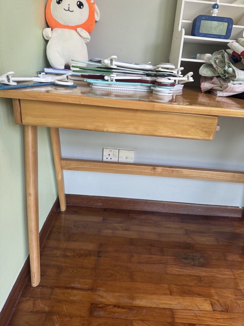 Solid Wood Study Table (Category: Tables & Sets) located in Singapore. Submitted by nasong34055 (Listing ID 1443556564, Image 2). Description: * Length: 120 cm * Width: 60 cm * Height: 75 cm * 1 Drawer: 50 cm (W) × 6 cm (H) * Solid wood construction * Good condition * Suitable for study room, bedroom or home office.
