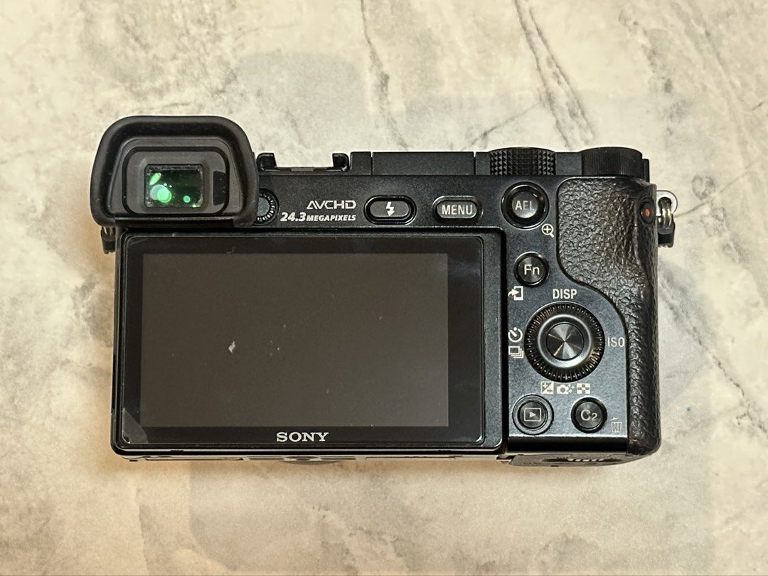 Sony a6000 with Kit Lens (Category: Cameras) located in Quezon City. Submitted by penguinco (Listing ID 1443561728, Image 3). Description: 📸 Sony a6000 Mirrorless Camera (ILCE-6000L) - bought in 2019 at Sony SM North - 11,800 shutter count (low usage) - comes with original box, manuals - body + 16-50mm Power Zoom Lens - eyepiece cap - lens cap - micro usb cable + power cord (charger) - rechargeable battery - shoulder strap 👉 Free Extras (see la