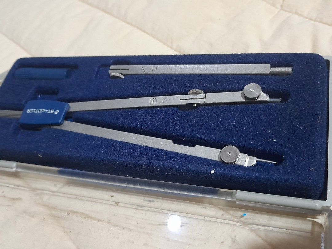 Staedtler Compass Set with Case (Category: Stationery & School Supplies) located in Quezon City. Submitted by alexayizhou (Listing ID 1443539638, Image 3). Description: Staedtler compass set, includes main compass, extension bar, and pencil holder in original case Shipping: Lalamove or GrabExpress (shipping to be shouldered by buyer) MOP: Gcash to be sent before pick up or during meet up (cash allowed) No returns! WYSIWYG.