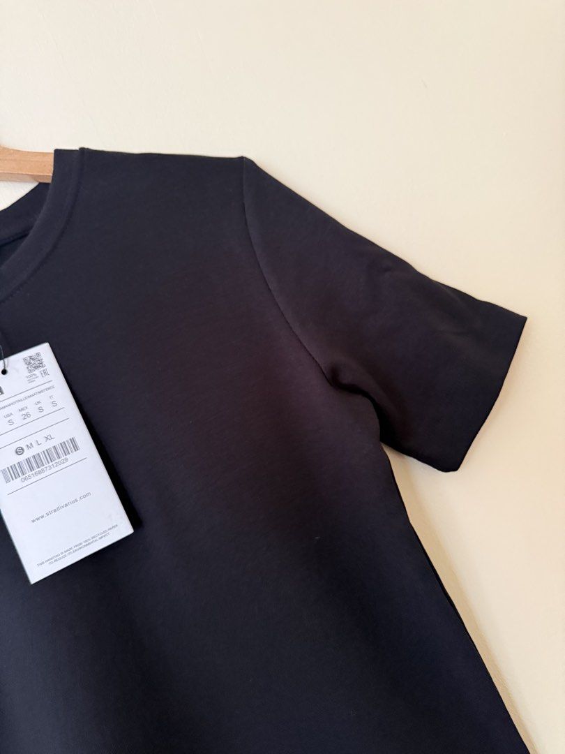 Stradivarius black ribbed cotton crew neck top (Category: Shirts) located in Makati City. Submitted by cutefabph (Listing ID 1443560424, Image 3). Description: 🛍️Pls.take time to read… 🛍️ Pls take note that some ww photos are inspired & not the actual one itself. 🛍️🛍️Gentle Reminder:🛍️🛍️ We measured every item esp trousers & other bottoms thru flat-lay… We will not allow refund & return anymore. So pls take time to read the description box 