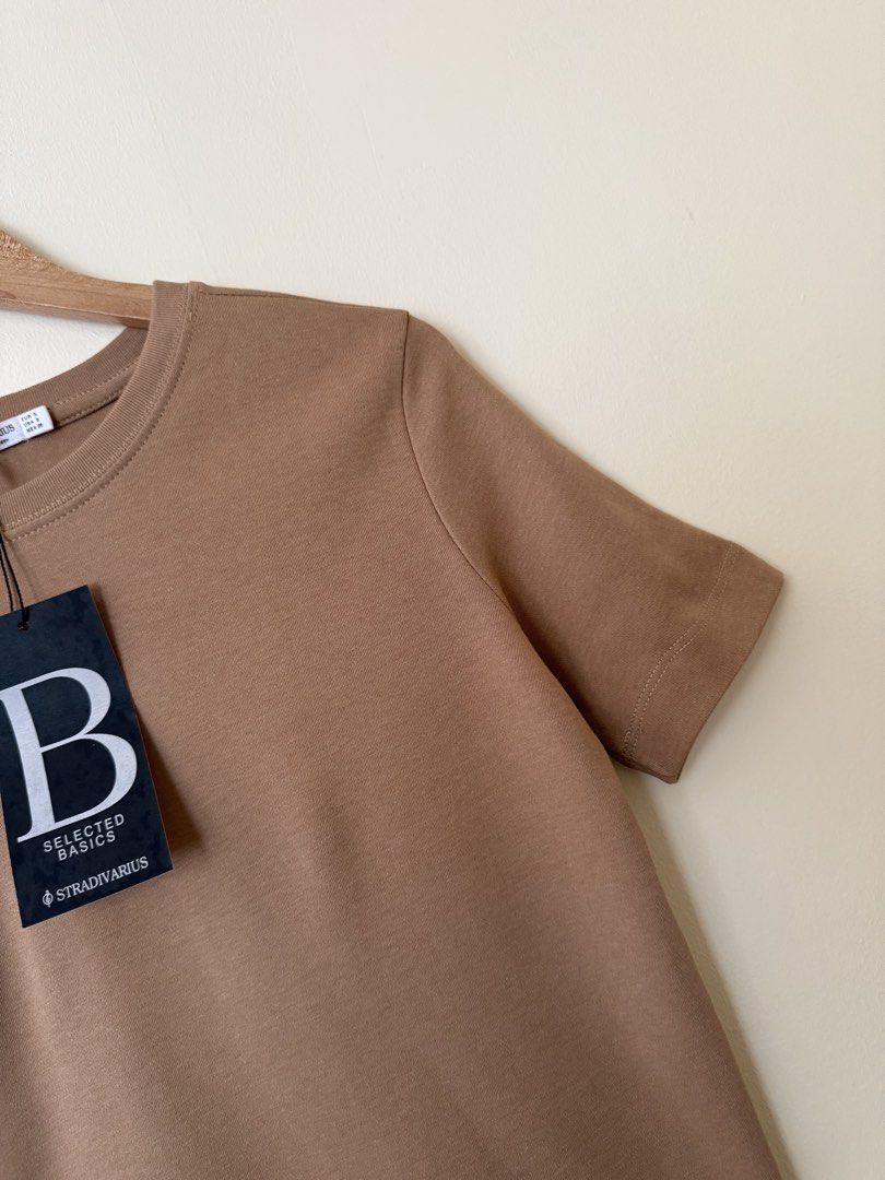 Stradivarius brown basic crew neck top (Category: Shirts) located in Makati City. Submitted by cutefabph (Listing ID 1443561328, Image 2). Description: 🛍️Pls.take time to read… 🛍️ Pls take note that some ww photos are inspired & not the actual one itself. 🛍️🛍️Gentle Reminder:🛍️🛍️ We measured every item esp trousers & other bottoms thru flat-lay… We will not allow refund & return anymore. So pls take time to read the description box to avoid