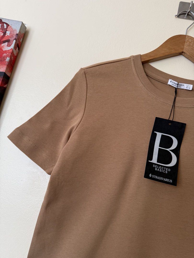 Stradivarius brown basic crew neck top (Category: Shirts) located in Makati City. Submitted by cutefabph (Listing ID 1443561328, Image 3). Description: 🛍️Pls.take time to read… 🛍️ Pls take note that some ww photos are inspired & not the actual one itself. 🛍️🛍️Gentle Reminder:🛍️🛍️ We measured every item esp trousers & other bottoms thru flat-lay… We will not allow refund & return anymore. So pls take time to read the description box to avoid