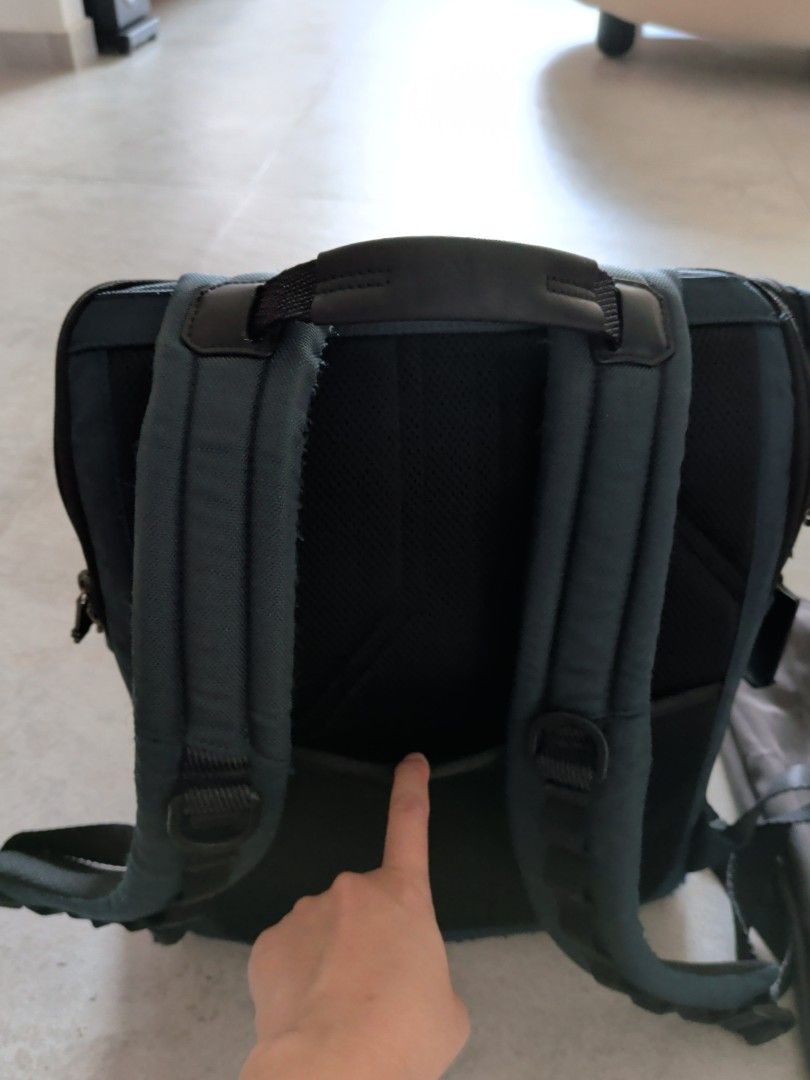 Tumi Backpack (Category: Backpacks) located in Singapore. Submitted by be_positive (Listing ID 1443536622, Image 2). Description: - Tumi backpack - Multiple internal compartments for organization - Comfortable straps and back padding - with luggage slot, great for travel - Includes original Tumi dust bag - some stain as per picture not affecting usage price includes courier delivery or self collect from amk ave 5 .