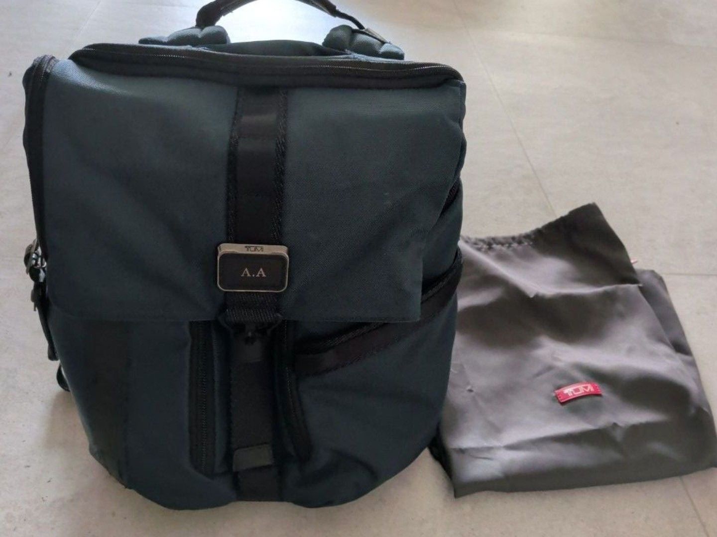 Tumi Backpack (Category: Backpacks) located in Singapore. Submitted by be_positive (Listing ID 1443536622, Image 1). Description: - Tumi backpack - Multiple internal compartments for organization - Comfortable straps and back padding - with luggage slot, great for travel - Includes original Tumi dust bag - some stain as per picture not affecting usage price includes courier delivery or self collect from amk ave 5 .