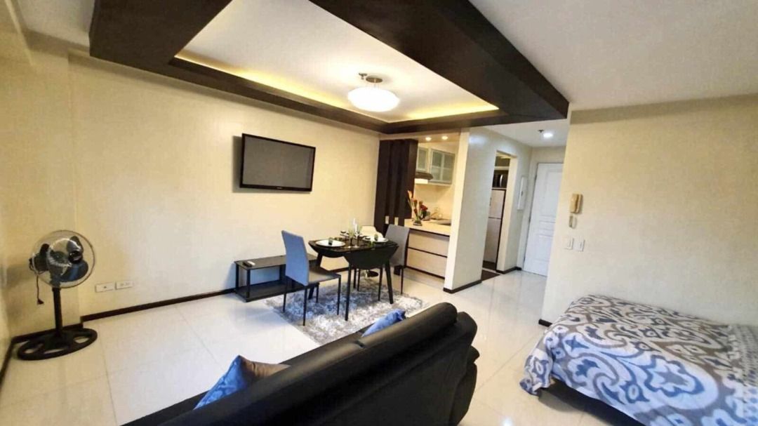 Two Serendra BGC Studio Unit with parking slot (Category: Apartments & Condos) located in Manila. Submitted by true.crischa (Listing ID 1443606606, Image 3). Description: Topmost Floor, corner unit 45 sqm with private balcony directly facing Market! Market! Parking slot - 12.5 sqm conveniently located close to elevator.