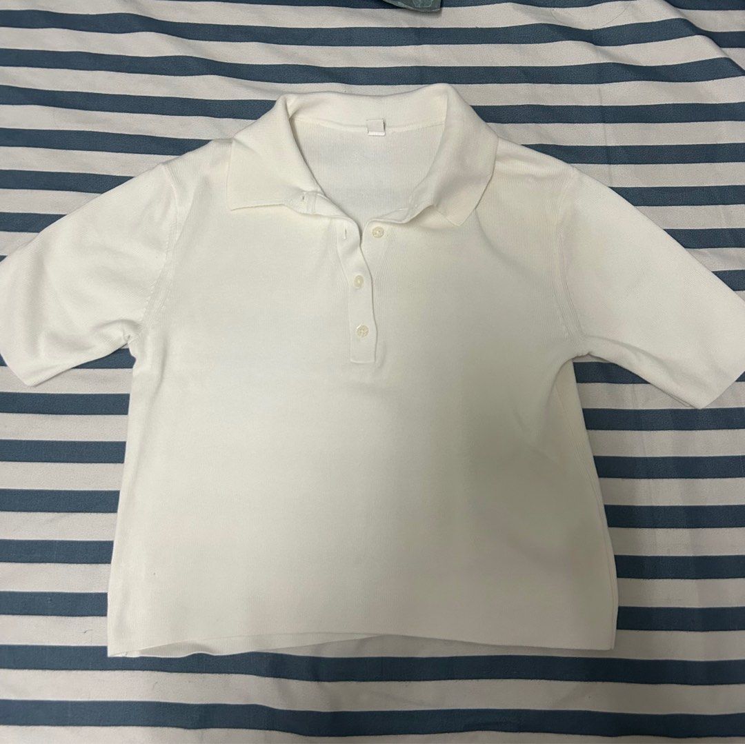 Uniqlo White Polo Short Sleeve Size S (Category: Coats, Jackets and Outerwear) located in Manila. Submitted by worstdumpling (Listing ID 1443526821, Image 2). Description: - White Uniqlo Polo - Simple button-up style - Soft, comfortable material - Versatile for layering or wearing solo - Size: Small (S).