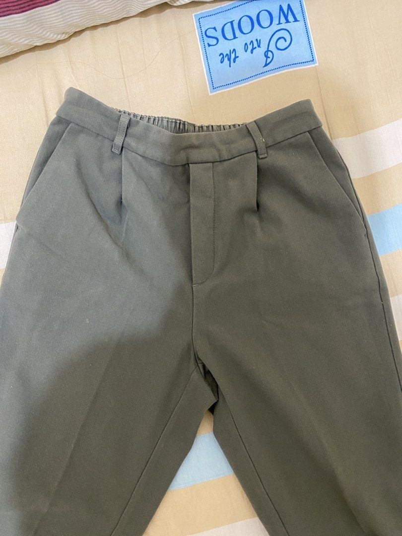 Uniqlo/GU Trouser (Category: Other Bottoms) located in San Jose. Submitted by justcherry (Listing ID 1440890267, Image 3). Description: - 350 each - Colors: Muted Olive Green - Design: Pleated front - Comfort: Elasticated back waistband - Versatile: Ideal for casual and smart-casual outfits - Easy to style with various tops.