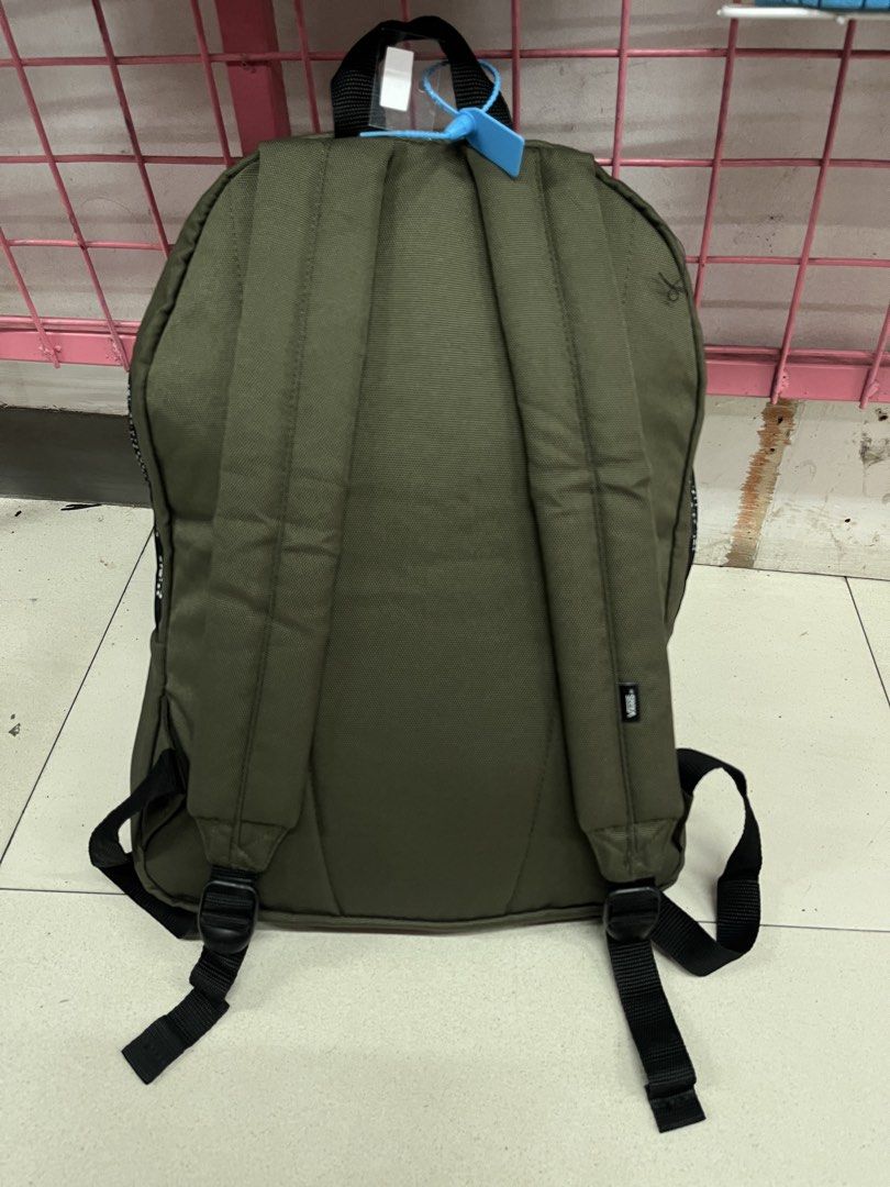 Vans OTW-66 Backpack Olive Green (Category: Backpacks) located in Bulacan. Submitted by sef19 (Listing ID 1443619590, Image 2). Description: - Vans backpack in olive green - Features Vans OTW-66 branding and coordinates on strap - Front mesh pocket for easy access - Interior lined with classic checkered pattern - Ideal for everyday carry and use.