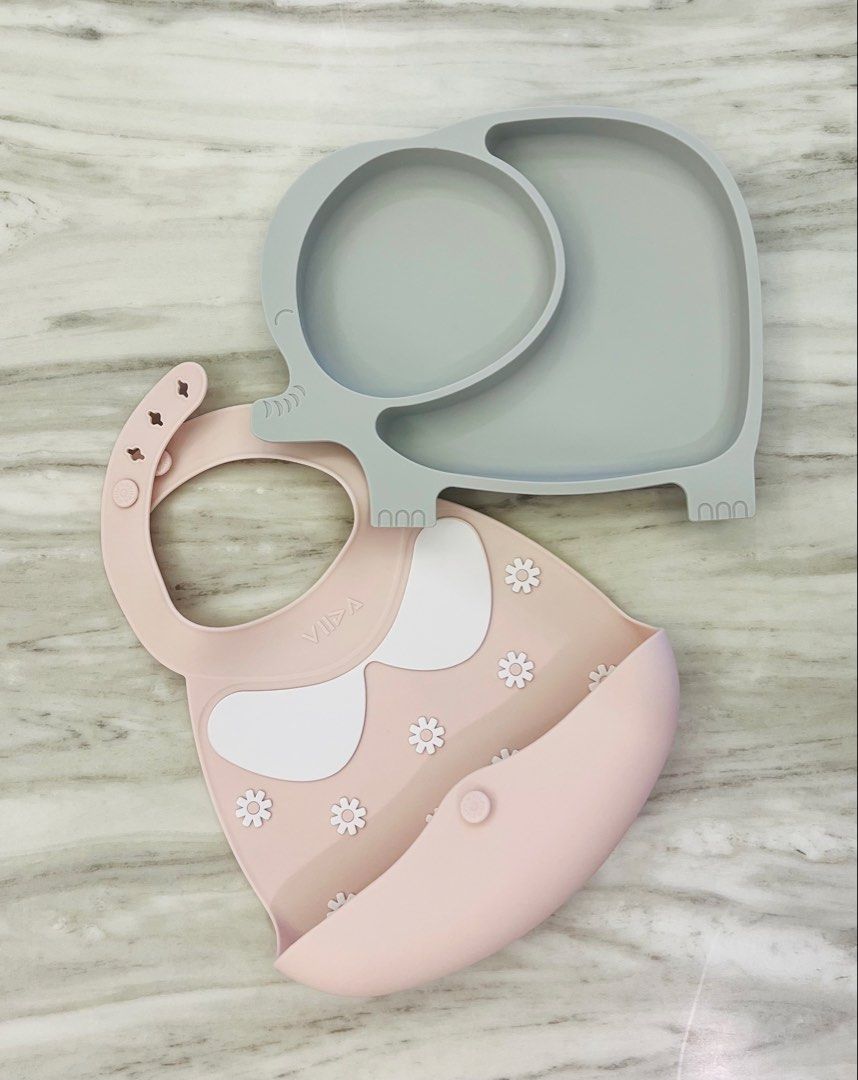 VIIDA SILICONE BIB FOR SALE!! (Category: Weaning & Toddler Feeding) located in Pasig City. Submitted by aresolme (Listing ID 1443610020, Image 1). Description: VIIDA PORTABLE SILICONE BIB - Color: Strawberry Milk - Water repellant with plastic adjustable snap button - Plate with suction as freebie **Payment first policy** **For Meet/Pick-up Only** 📍Pasig City.