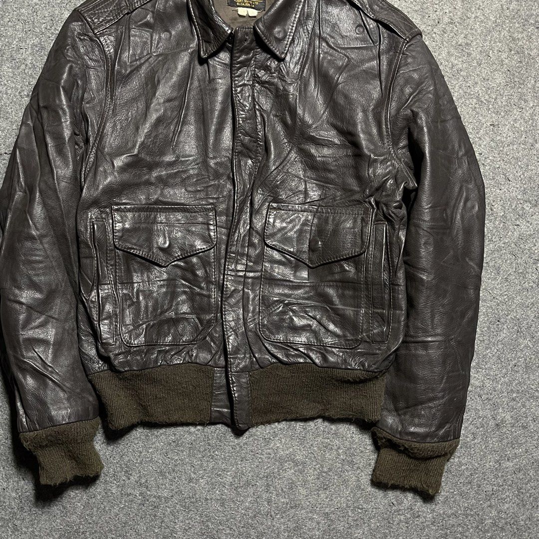 Vintage Repro Type A-2 leather flight Suit LTD EL Cojan Ca. Jacket (Category: Coats, Jackets and Outerwear) located in Zamboanga. Submitted by rag_20 (Listing ID 1443501993, Image 3). Description: Vintage Repro Type A-2 leather flight Suit LTD EL Cojan Ca. Bomber Jacket The tag is designed to mimic a vintage World War II military contract label (using historical terminology like “Drawing No. 30-1415” and “Property Air Force, U.S. Army”). However,