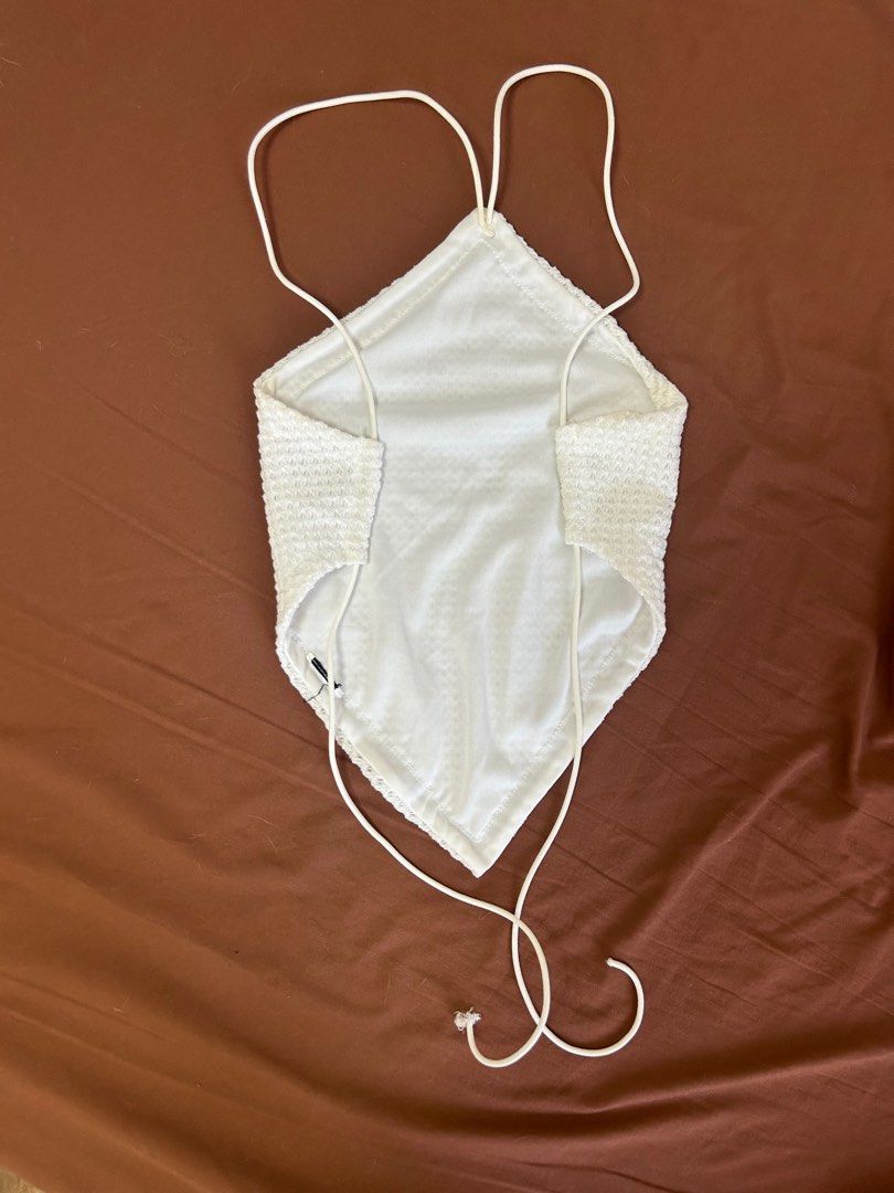 White halter top and mini skirt set (Category: Sets or Coordinates) located in Manila. Submitted by koolkeistore (Listing ID 1443666771, Image 3). Description: SHEIN. Can fit XS-S White textured halter, backless top and mini skirt set .