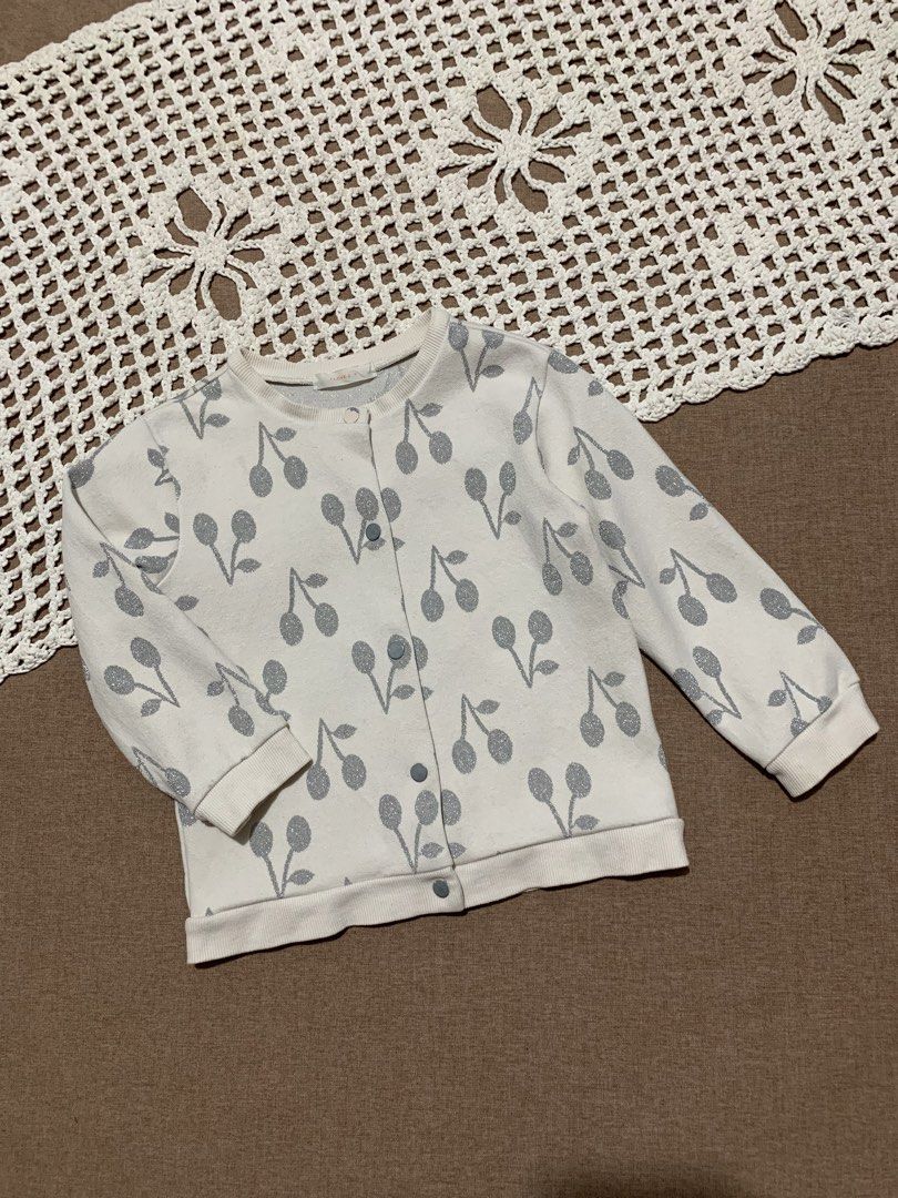 3T White Cherry Print Cardigan (Category: Babies & Kids Fashion) located in Davao. Submitted by _declutterwithme30 (Listing ID 1443908709, Image 1). Description: Excellent condition with fine lints.