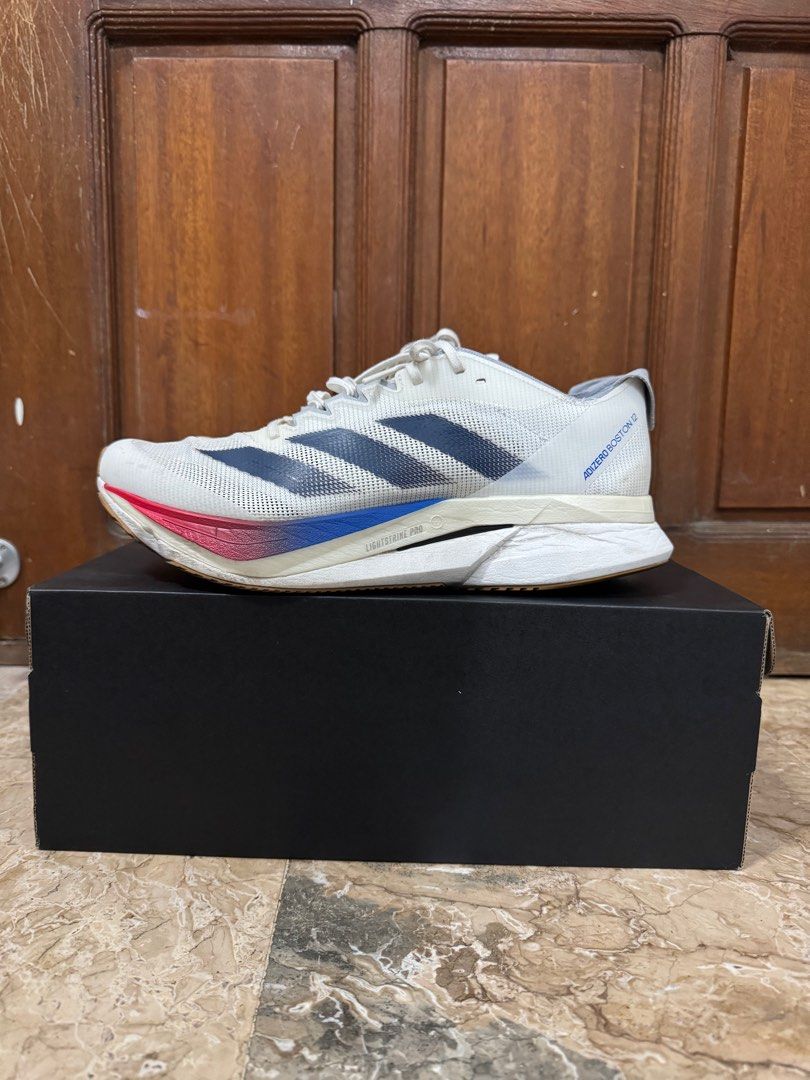 Adidas Boston 12 Running Shoes (Category: Sneakers) located in Pasig City. Submitted by jksonlineapparel.ph (Listing ID 1443861176, Image 3). Description: Boston 12 Running shoes with box Size: 8.5 Mens Needs cleaning Rfs: Declutter. .