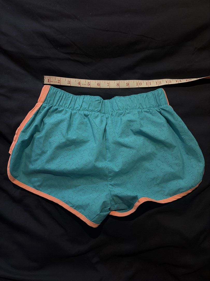 Adidas Climalite Teal Orange Running Shorts (Category: Activewear) located in Quezon City. Submitted by shopsoph (Listing ID 1443761396, Image 2). Description: - Teal running shorts with vibrant orange trim. - Perforated fabric for maximum breathability during workouts. - Comfortable elastic waistband for a secure fit and double lined - Iconic Adidas logo featured on the side. - RFS: hand me down from my cousin but not my style.