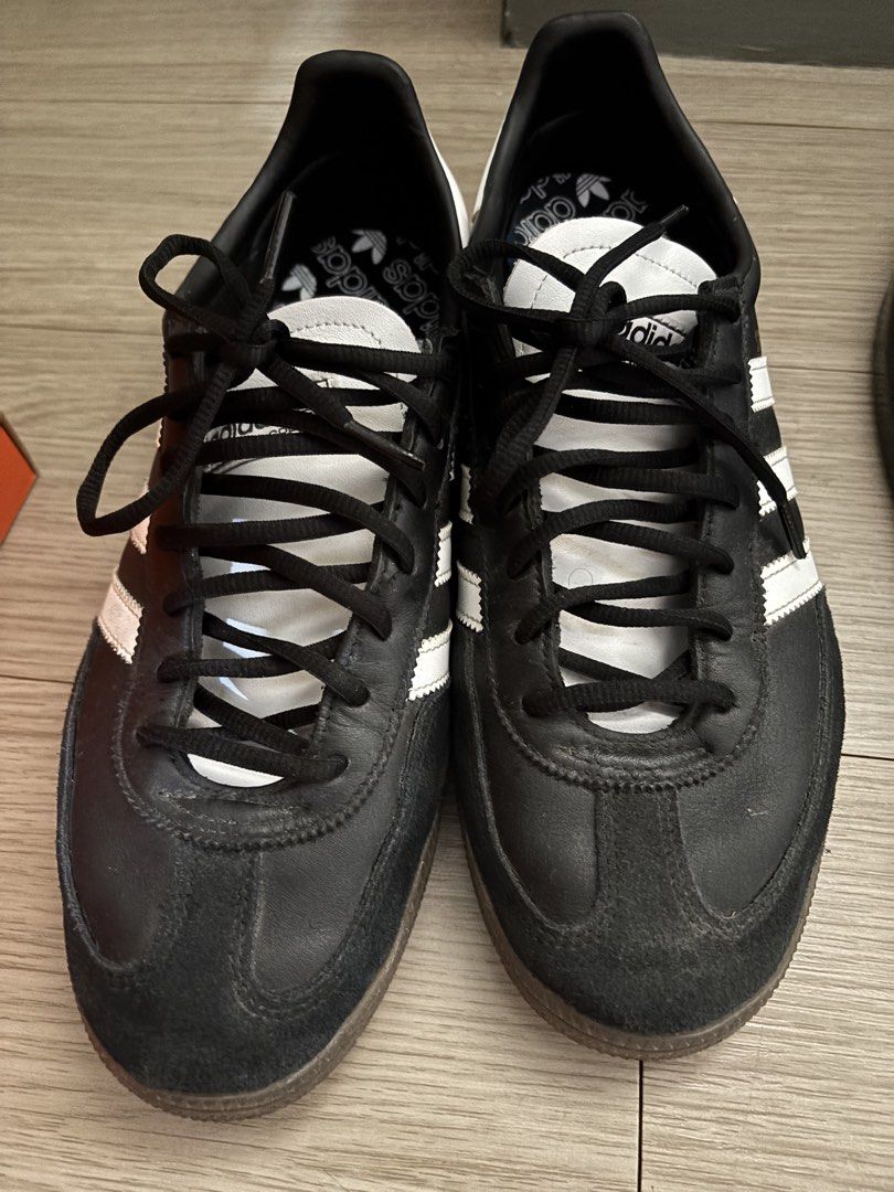 Adidas Handball Spezial (Black/White) (Category: Sneakers) located in Mandaluyong City. Submitted by jacobsss23 (Listing ID 1443757573, Image 2). Description: Adidas Handball Spezial Black White Gum Sole Sneakers - Adidas Spezial sneakers - Color: Black with white stripes - Features a classic gum sole - Size: 10US/9.5UK - Ideal for casual wear and sports With box negotiable.
