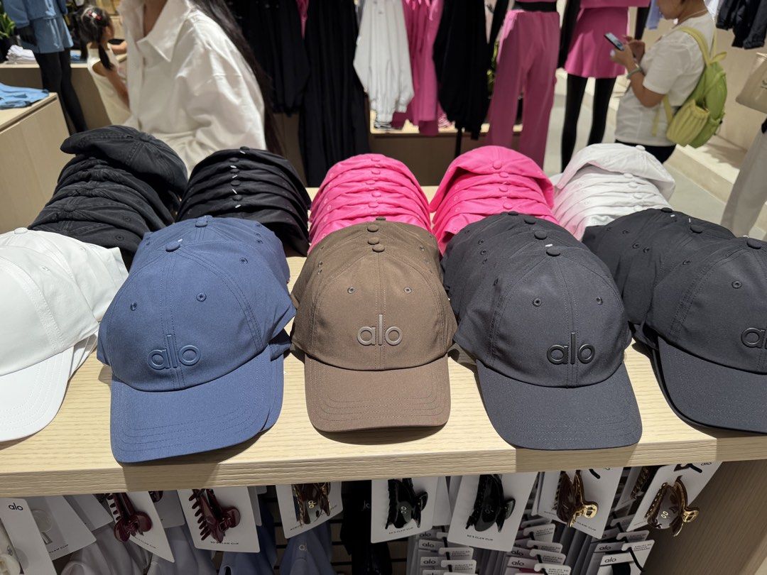 Alo Yoga Cap - Multiple Colors Available (Category: Caps & Hats) located in Singapore. Submitted by huatbigbig2025 (Listing ID 1443786234, Image 2). Description: - Brand: Alo Yoga - Colors Available: Blue, Brown, Dark Grey - Material: Durable - Design: Simple with Alo logo - Features: Adjustable strap for a good fit - Ideal for: Everyday wear and workouts.