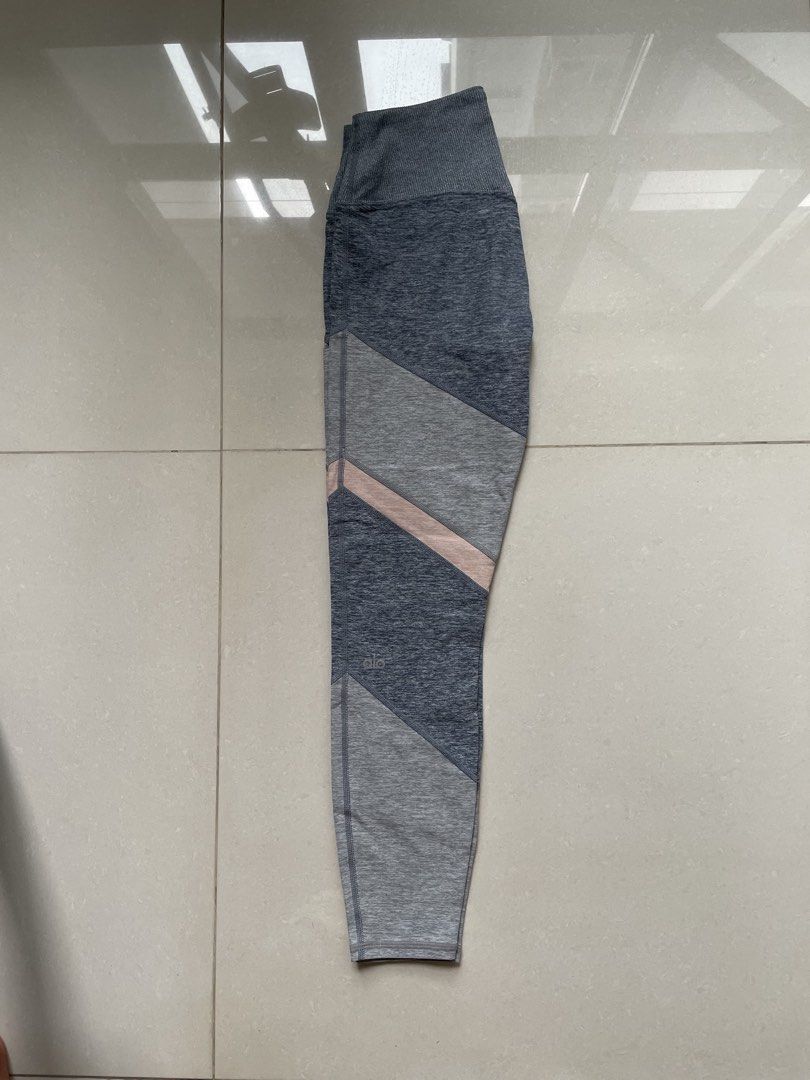 Alo Yoga Sheila Alosoft High Waist Leggings (Category: Activewear) located in Singapore. Submitted by tamo.ongo (Listing ID 1443861233, Image 2). Description: - Original price: $160 - Excellent condition, no defects - Size S. Fits Lululemon size 4-6. - Colour: Pink Grey Heathered - Super soft velvety, signature performance Alosoft material. - Versatile: Suitable for yoga or lounging Strictly no trades. .