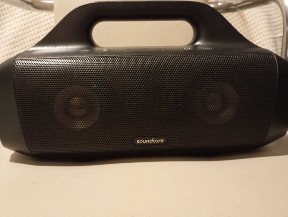 Anker Soundcore Motion Boom portable Bluetooth speaker (Category: Soundbars, Speakers & Amplifiers) located in Valenzuela. Submitted by shoppedemiel (Listing ID 1443882182, Image 2). Description: The speaker measures approximately 11.5 inches long, 6.5 inches tall, and 4 inches wide. It weighs about 54.38 oz (roughly 3.4 lbs). The top panel contains control buttons for power, Bluetooth pairing, volume adjustment, playback control, and the dedicat