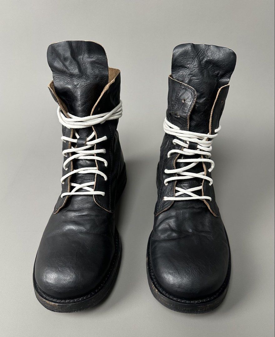 Ann Demeulemeester - S/S17 Glace Nero Washed Combat Boots. (Category: Boots) located in Manila. Submitted by scissor.2fifthy (Listing ID 1443737693, Image 2). Description: Ann Demeulemeester - S/S17 Glace Nero Washed Combat Boots. Tagged size: 39IT fits 7.5 Men’s Made in Italy Material: Leather 90/100 condition rate Used with care Flaw: Minor sign of usage only and replaced yellow lace. Very presentable Check all photos for more details and infor