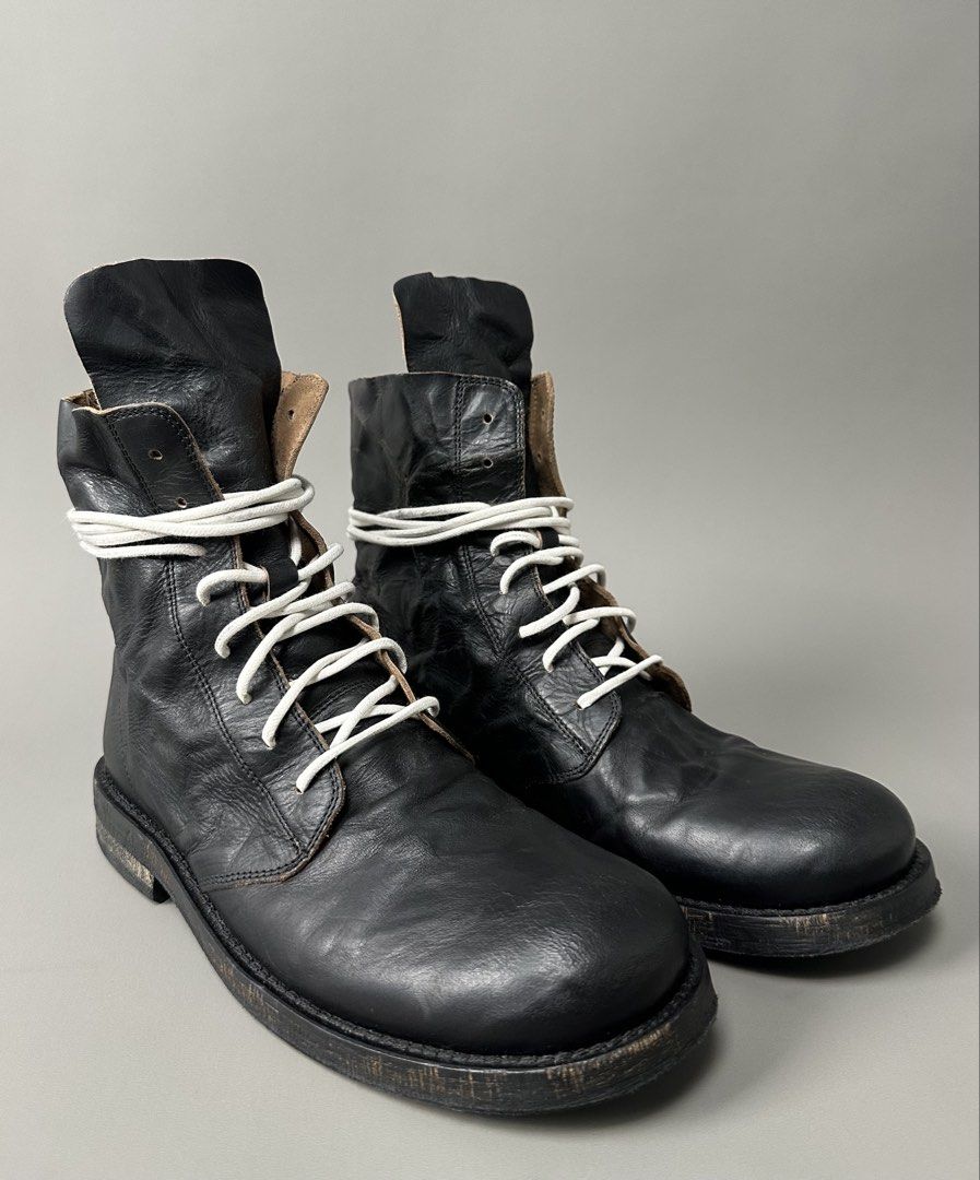 Ann Demeulemeester - S/S17 Glace Nero Washed Combat Boots. (Category: Boots) located in Manila. Submitted by scissor.2fifthy (Listing ID 1443737693, Image 1). Description: Ann Demeulemeester - S/S17 Glace Nero Washed Combat Boots. Tagged size: 39IT fits 7.5 Men’s Made in Italy Material: Leather 90/100 condition rate Used with care Flaw: Minor sign of usage only and replaced yellow lace. Very presentable Check all photos for more details and infor