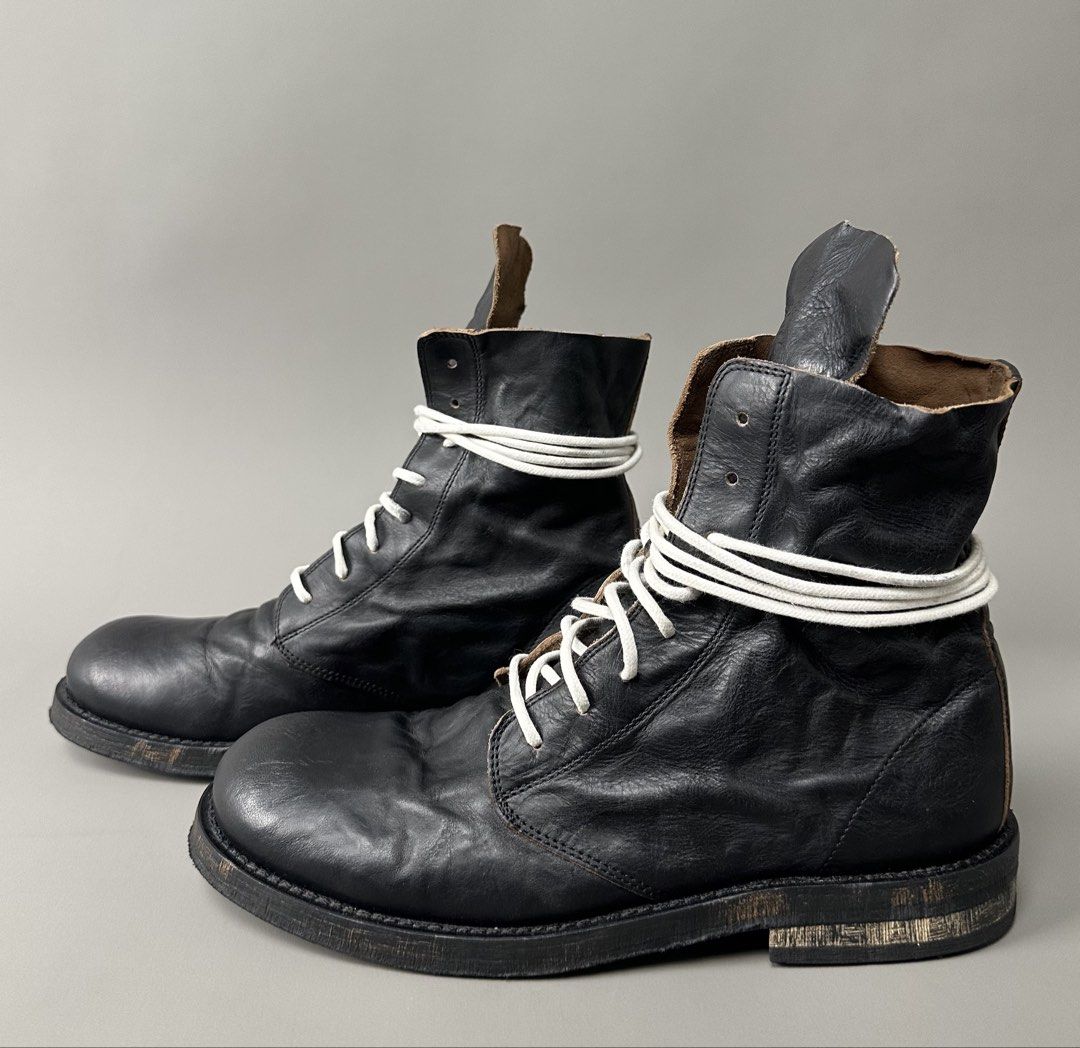 Ann Demeulemeester - S/S17 Glace Nero Washed Combat Boots. (Category: Boots) located in Manila. Submitted by scissor.2fifthy (Listing ID 1443737693, Image 3). Description: Ann Demeulemeester - S/S17 Glace Nero Washed Combat Boots. Tagged size: 39IT fits 7.5 Men’s Made in Italy Material: Leather 90/100 condition rate Used with care Flaw: Minor sign of usage only and replaced yellow lace. Very presentable Check all photos for more details and infor