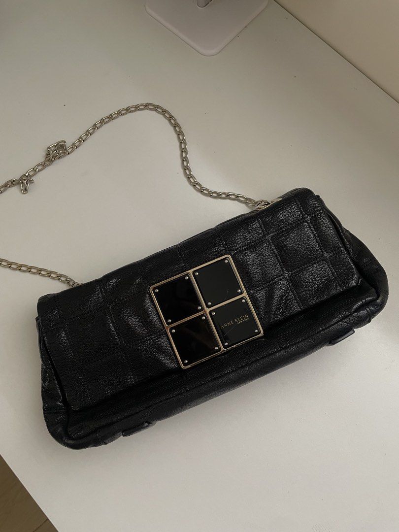 Anne Klein Black Quilted Chain Shoulder Bag (Category: Shoulder Bags) located in Mabalacat. Submitted by fusecollective (Listing ID 1443742087, Image 1). Description: Still in good condition Slightly tarnished chains but not rusty 🛵Delivery via J&T 📍Loc: Mabalacat, Pampanga.
