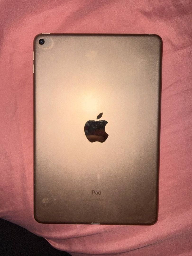 Apple IPad Mini 5th gen (Category: iPad) located in Binan City. Submitted by calvin654132317 (Listing ID 1443713913, Image 3). Description: - Apple iPad Mini 5th generation - Color: Gold - Storage: 64GB - Condition: Good, with minor signs of use on screen - Compact and portable design - Ideal for browsing, entertainment, and productivity.