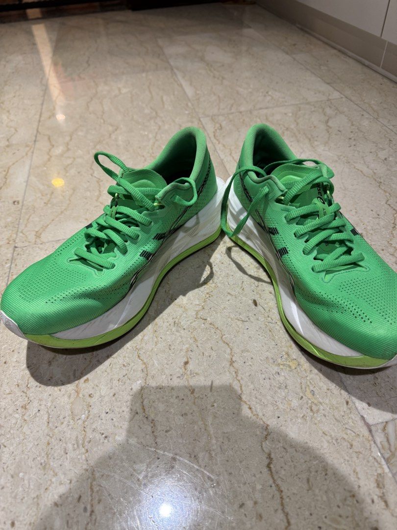ASICS Sonicblast Sn61 Vital Green/Black Running Shoes (Category: Sneakers) located in Singapore. Submitted by tch_9399 (Listing ID 1443865526, Image 2). Description: - ASICS Sonicblast Sn61 running shoes - Color: Vital Green/Black - Size: US 8.5 (EU 42) - mileage 30km - Condition: Lightly used, soles show some signs of wear but plenty of tread remaining - Suitable for: Running and training - Includes: Original box.