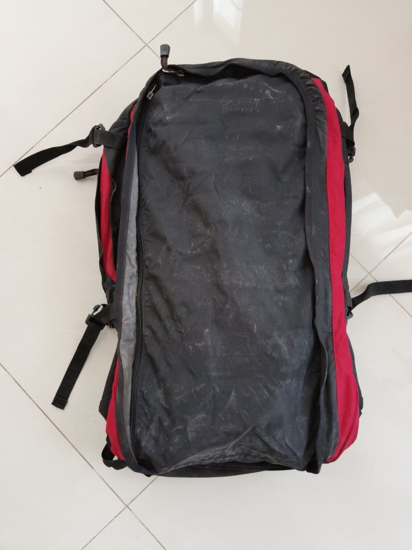 Backpack (Category: Backpacks) located in Singapore. Submitted by hellocrs (Listing ID 1443834653, Image 3). Description: - Black and red hiking backpack - 'Air Cooler Back System' for comfort - Multiple straps and buckles for secure carrying - Ideal for outdoor adventures or travel - Some signs of wear, but fully functional.