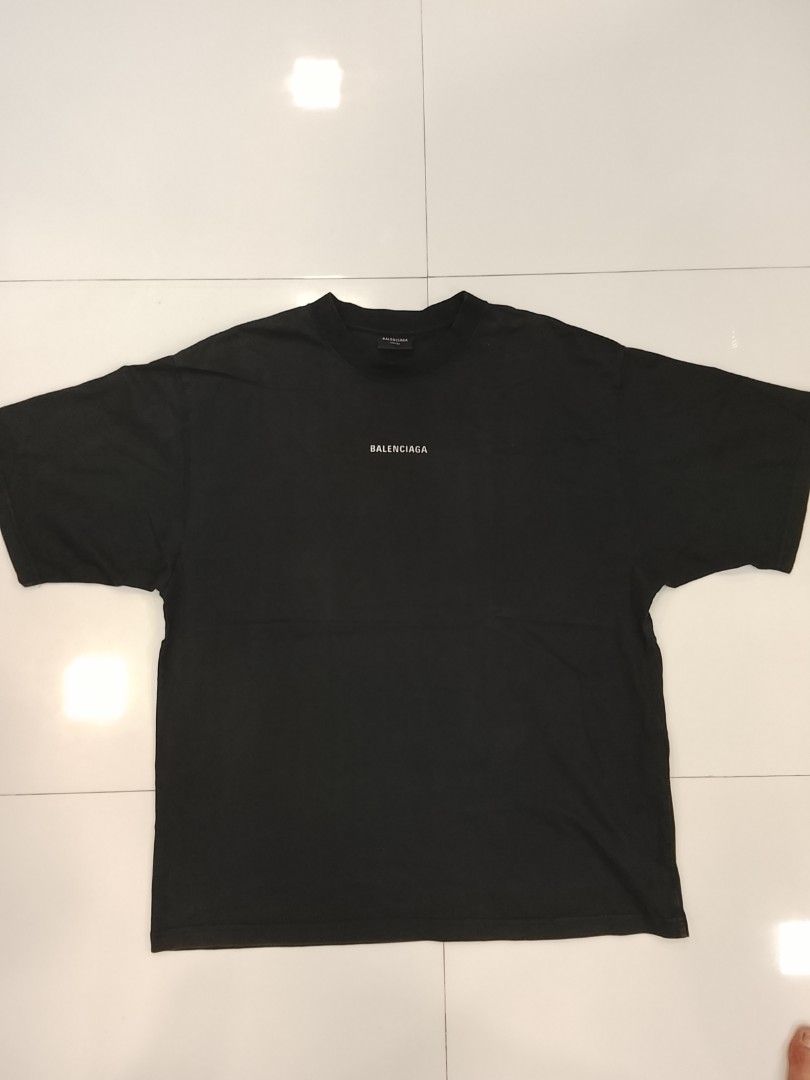 Balenciaga 3M Reflectorized Rear Logo Shirt (Authentic) (Category: Luxury Apparel) located in Pasig City. Submitted by thriftshop.pinas (Listing ID 1443761218, Image 3). Description: Balenciaga 3M Reflectorized Rear Logo Shirt (Authentic) -Size: Small on tag but fit up to XL -Dimes: 23 x 29 -Color Rate: 8 / 10 -Condition: Good -Complete Tags -Issue: Peel some prints on (N) and (C).