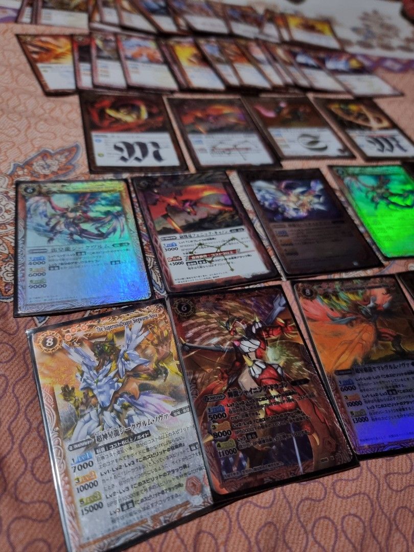 Battle Spirits Trading Card Games (Category: Raw Singles) located in Imus. Submitted by aim_for_less (Listing ID 1443829791, Image 3). Description: Collection of Battle Spirits trading cards 48pcs - Includes rare and holographic cards - Ideal for collectors and players - Sold as a lot - Feel free to ask questions - In excellent condition - (5pcs. "X" Rare) - (5pcs. "M" Rare) - (4pcs. "R" ) - (34pcs. Mix "U" and "C") LOCATION: IMUS, CAVITE.