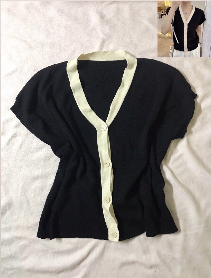 Black and Cream V-Neck Button Up Knitted Top (Category: Blouses) located in Manila. Submitted by juichiro (Listing ID 1443904284, Image 1). Description: Black and Cream V-Neck Button Up Knitted Top - Like new condition - Button-up front - Freesize Price: ₱150 Loc: Sampaloc, Manila Delivery fee should be shouldered by the buyer.
