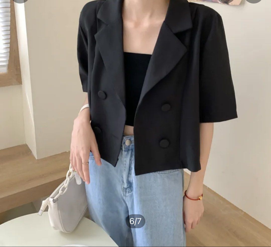 Black Cropped Double-Breasted Short Sleeve Blazer (Category: Coats, Jackets and Outerwear) located in Manila. Submitted by jmlois (Listing ID 1443863625, Image 2). Description: - Cute black cropped blazer - Short sleeves - Double-breasted style with two buttons - Ideal for layering over tops or dresses - Versatile for various outfits, pairs well with jeans or skirts.