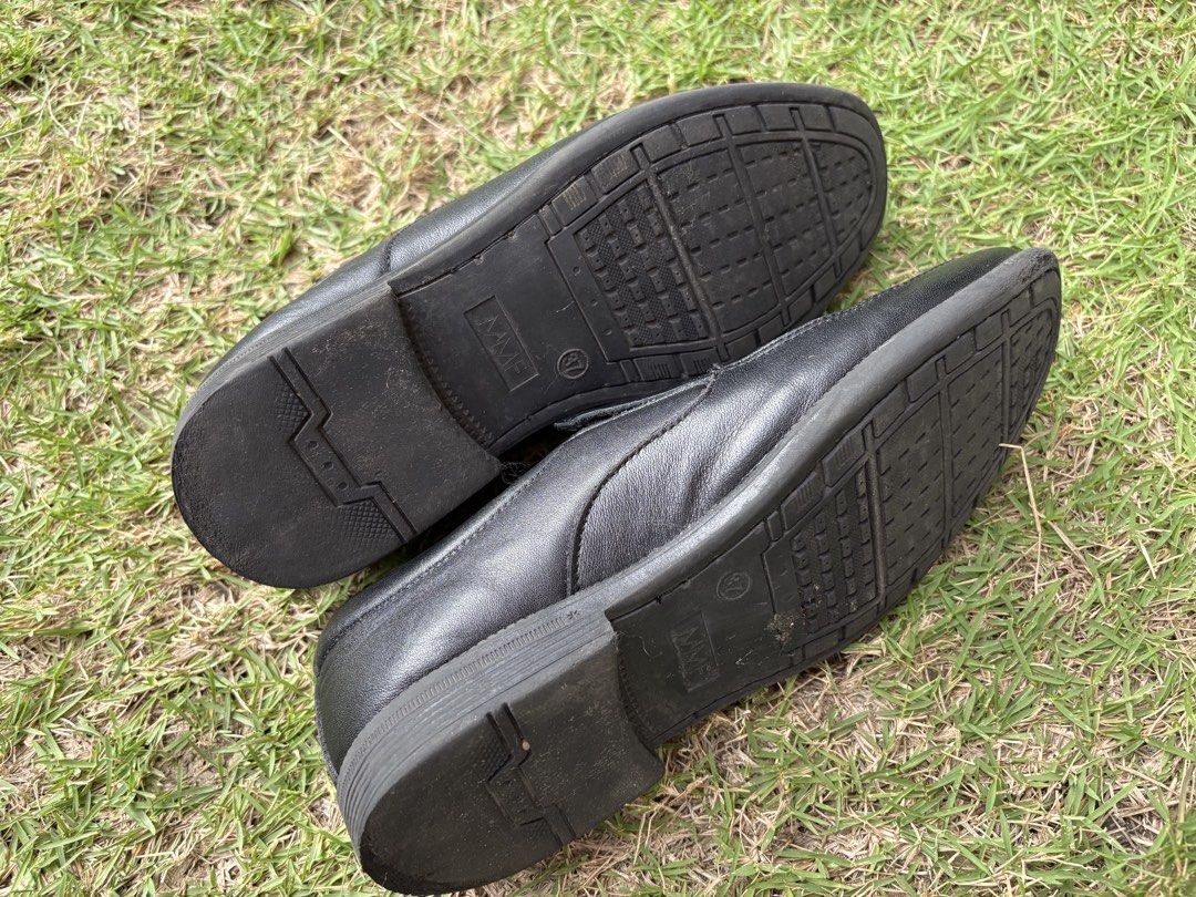 Black Leather Slip-On Shoes (Category: Babies & Kids Fashion) located in Paranaque City. Submitted by sqt_closet (Listing ID 1443821424, Image 2). Description: - Black leather slip-on shoes - Size 37 - Shows creasing from normal use (please check photos for details).