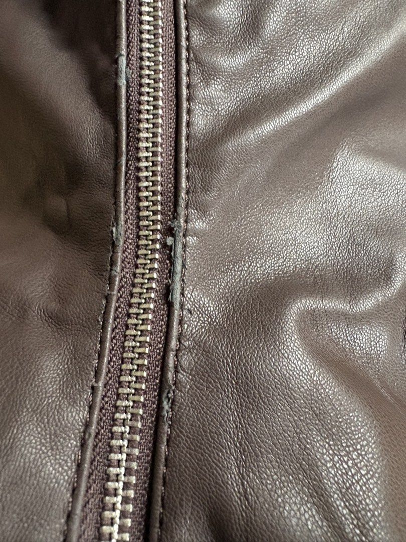 BOCU Brown Leather Hobo Shoulder Bag (Category: Shoulder Bags) located in Quezon City. Submitted by brandedthingsforless (Listing ID 1443909635, Image 3). Description: - Brand: BOCU - Material: Brown vegan Leather - Style: Hobo, Soft, Slouchy - Closure: Zipper - Features: Plenty of space, great for everyday use.