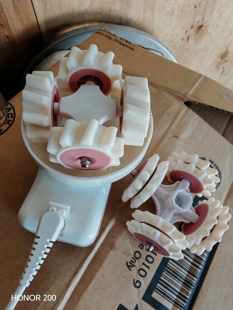 Body Spin 3D Cellulite Massager Roller (Category: Massage Devices) located in Manila. Submitted by mariceloch01539 (Listing ID 1443732449, Image 1). Description: - Rose gold Body Spin 3D massager - Helps reduce the appearance of cellulite - Comes with extra rollers for versatile use - Fully functional and works well - Features a convenient power button.