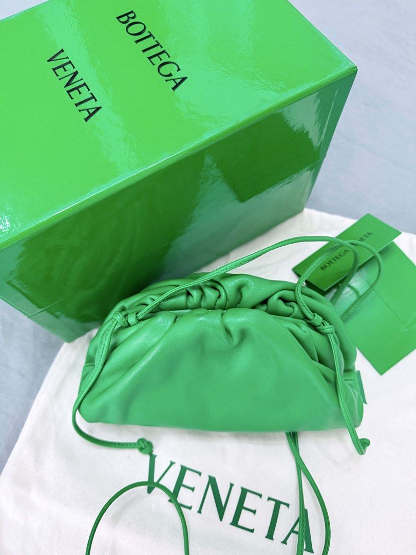 Bottega Veneta Mini Pouch (Category: Luxury Bags & Wallets) located in Makati City. Submitted by lms_nat (Listing ID 1443790545, Image 2). Description: - Authentic Bottega Veneta mini pouch color parakeet the bottega veneta green - Striking bright green color - Includes original dust bag, box, and authenticity card - Crafted from soft, gathered leather - Ideal for evening wear or adding a pop of color to any ensemble price 55k yr 2021.