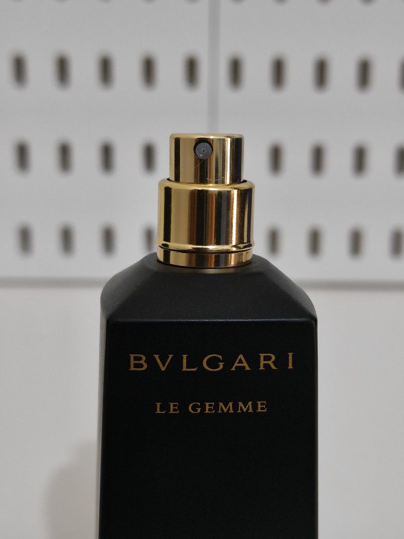 Bvlgari Le Gemme Kobraa Eau de Parfum 30ml (Category: Fragrance & Deodorants) located in Manila. Submitted by chaddiee (Listing ID 1443702886, Image 3). Description: - Bvlgari Le Gemme Kobraa Eau de Parfum - 30ml bottle - Includes original pouch - Features a black bottle with elegant gold accents - Unique cap design - Highly praised for its great scent -No Box -Approximately 28ml remaining .
