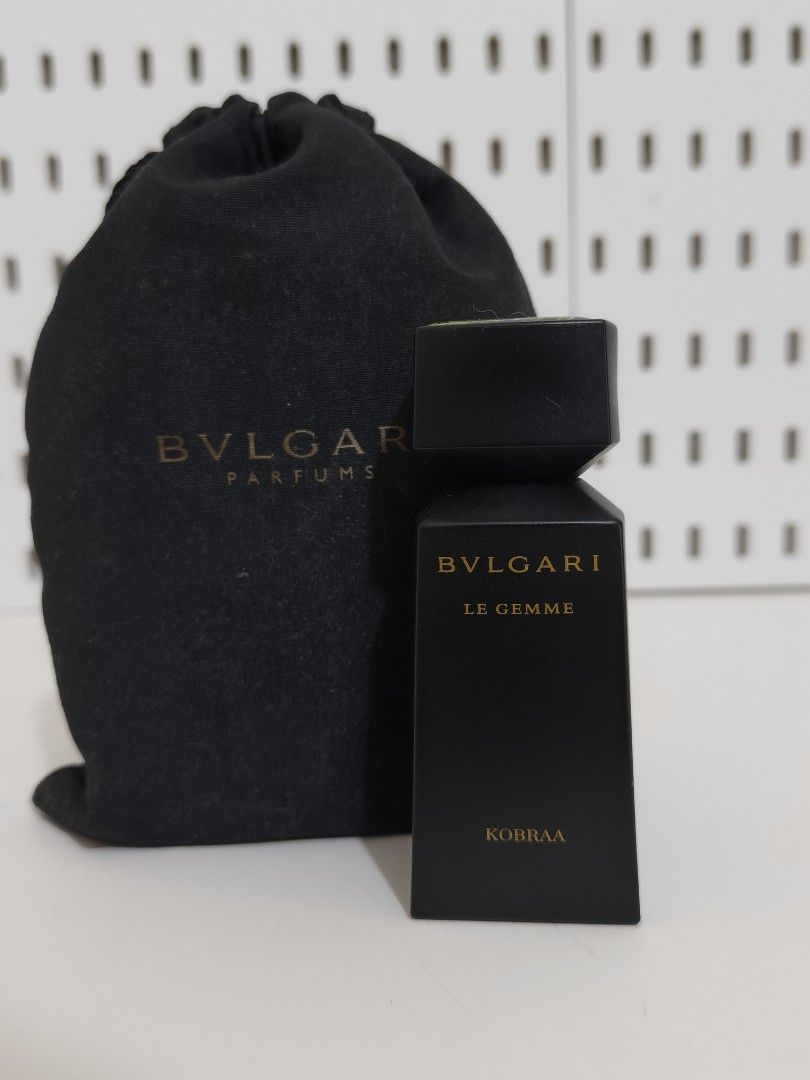 Bvlgari Le Gemme Kobraa Eau de Parfum 30ml (Category: Fragrance & Deodorants) located in Manila. Submitted by chaddiee (Listing ID 1443702886, Image 1). Description: - Bvlgari Le Gemme Kobraa Eau de Parfum - 30ml bottle - Includes original pouch - Features a black bottle with elegant gold accents - Unique cap design - Highly praised for its great scent -No Box -Approximately 28ml remaining .