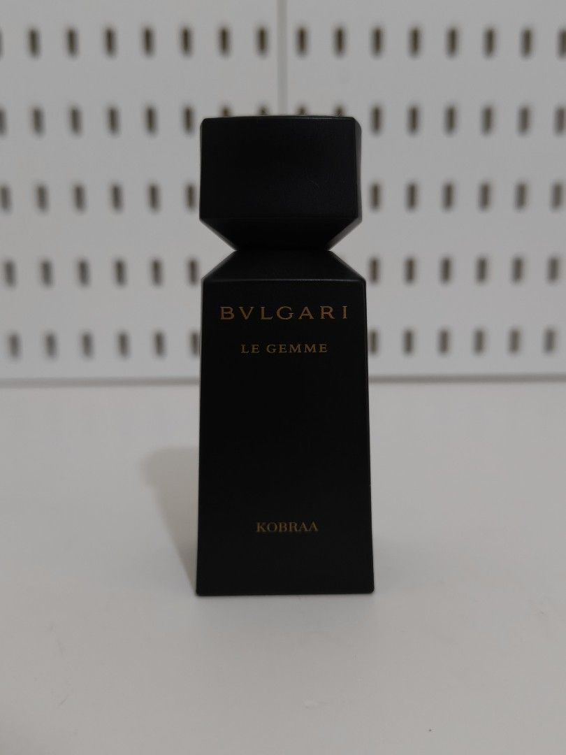 Bvlgari Le Gemme Kobraa Eau de Parfum 30ml (Category: Fragrance & Deodorants) located in Manila. Submitted by chaddiee (Listing ID 1443702886, Image 2). Description: - Bvlgari Le Gemme Kobraa Eau de Parfum - 30ml bottle - Includes original pouch - Features a black bottle with elegant gold accents - Unique cap design - Highly praised for its great scent -No Box -Approximately 28ml remaining .