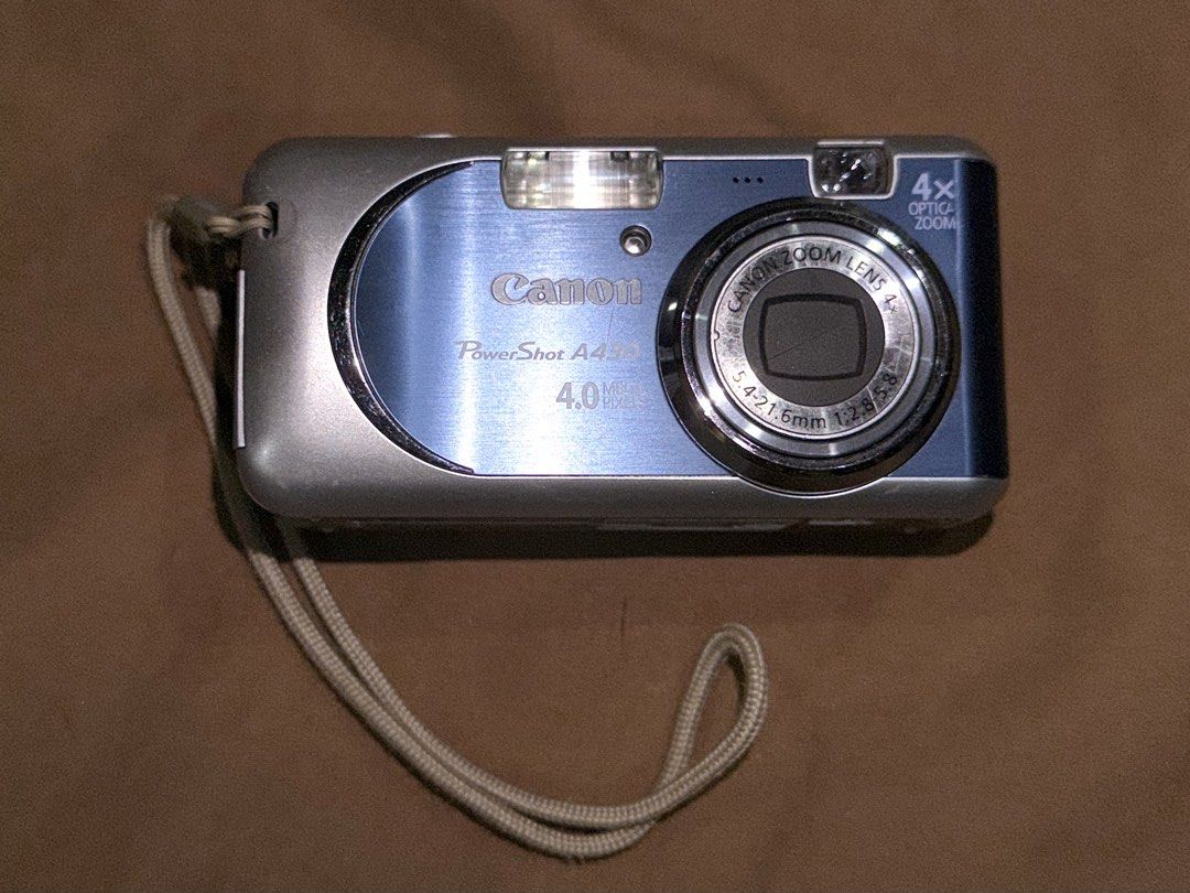 CANON PowerShot A430 Optical Zoom Digital Camera (Category: Cameras) located in Rizal. Submitted by alearchives (Listing ID 1443785792, Image 1). Description: CANON Blue and Silver PowerShot A430 Optical Zoom Digital Camera 💙🩶 Condition: - Secondhand; with scratches and sign of wears but fully functional -LCD appears to have no issue or damage. Still display photos well - Clean lens and all buttons are still functional and are working (not hard