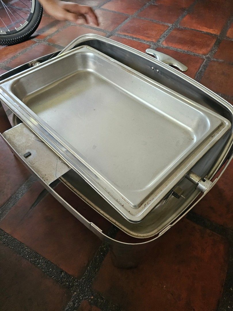 Chafing dish / serving dish, 2 sets (Category: Other Kitchenware & Tableware) located in Paranaque City. Submitted by gabriellecruz89 (Listing ID 1443780718, Image 2). Description: - Shiny chafing dish, perfect for events and keeping food warm. - Material: Durable stainless steel construction. - Ideal for parties, gatherings, and everyday use. -heavy duty -P5000 for 2 pcs - Meetup location: Merville Park Subdivision, Parañaque City. 63 cm x 44 cm