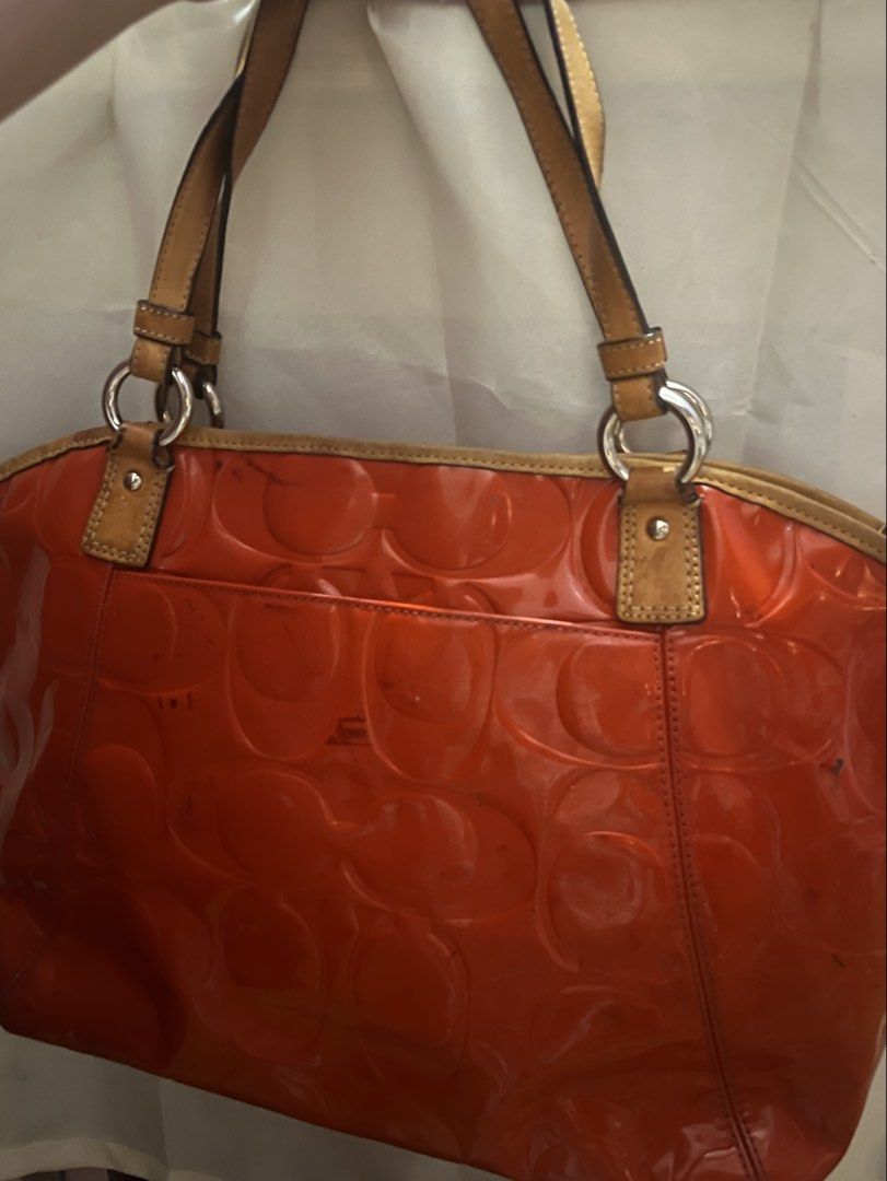 Coach Red Patent Leather Tote Bag (Category: Luxury Bags & Wallets) located in Santa Rosa. Submitted by mo0chimi (Listing ID 1443799053, Image 3). Description: - Red Coach patent leather tote bag - Dark Red & Black Color Transfers in the leather body, other than that no flaws. - Coded Creed, YKK Zip.