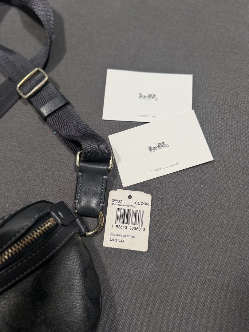Authentic Coach Signature Canvas Belt Bag (Category: Luxury Bags & Wallets) located in Manila. Submitted by rcxyz (Listing ID 1443877786, Image 2). Description: - Authentic Coach Belt Bag - Signature Print (Black & Grey) - Signs of Usage in Gold Hardware Details - Adjustable Strap - Includes Care Cards & Original Tag - Bought from US Slightly negotiable .