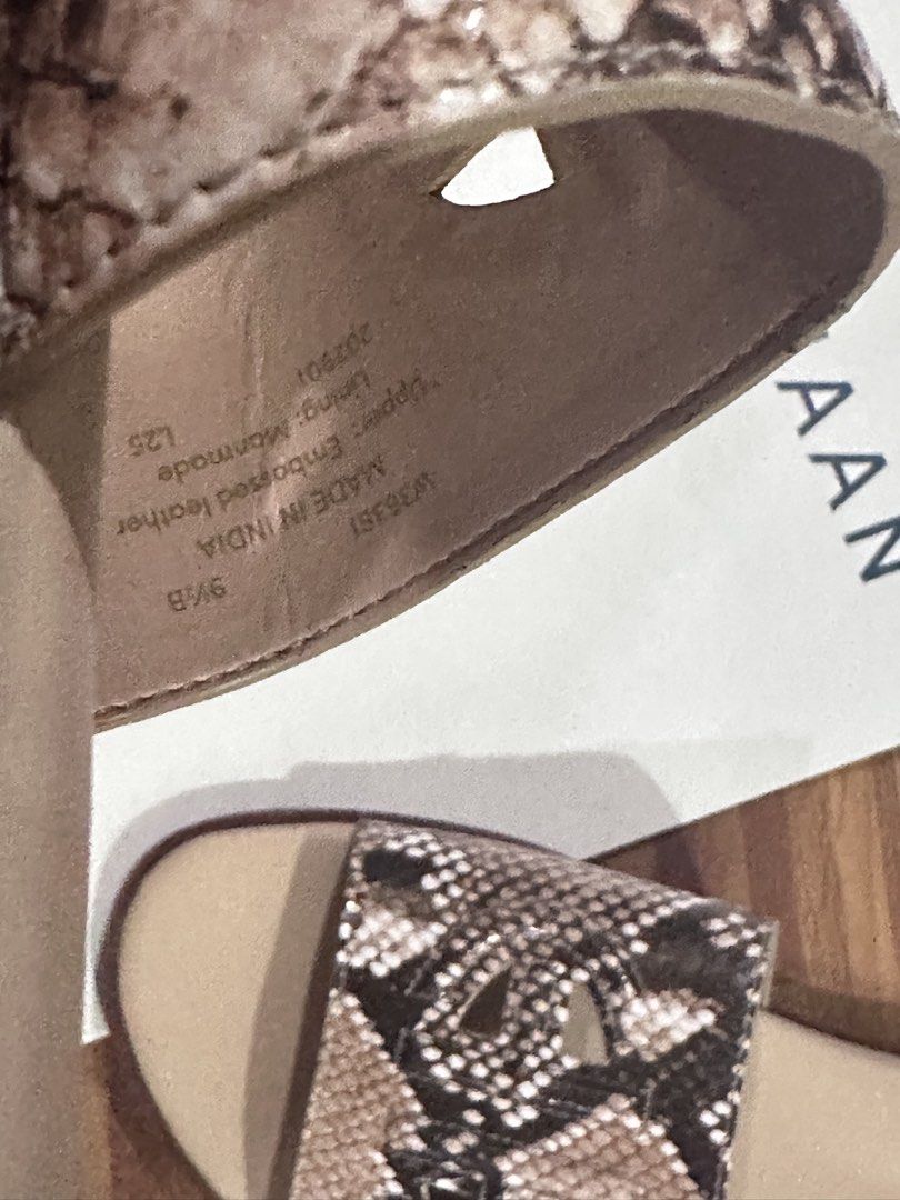 Cole Haan Snake Print Slide Sandals (Category: Flats & Sandals) located in Pasig City. Submitted by kyle.closet (Listing ID 1443711163, Image 3). Description: - Cole Haan slide sandals - Chic snake print design - Stylish cut-out strap details - Made in India - Size: 9.5 best fit 9 - Comes with original Cole Haan box and shopping bag.