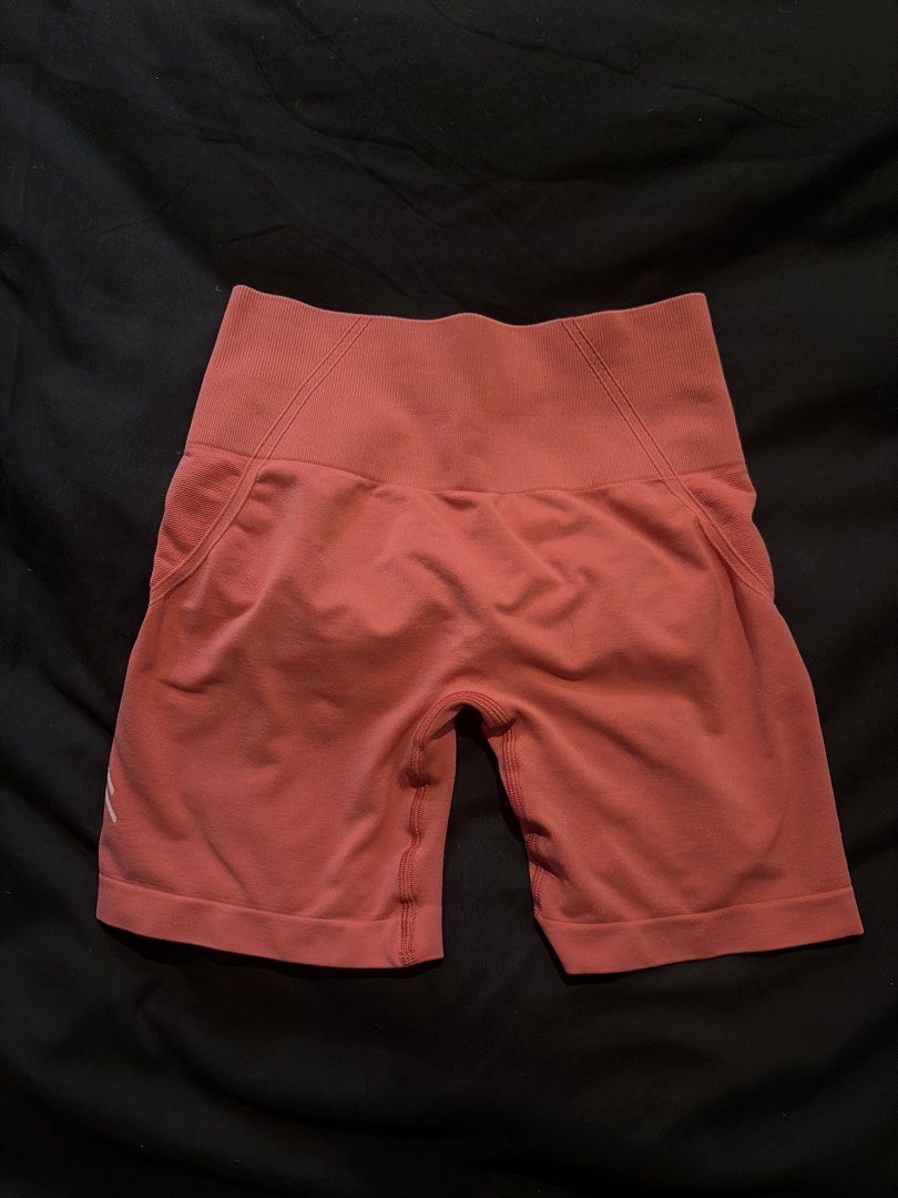 Coral High Waisted Seamless Workout Shorts (Category: Activewear) located in Quezon City. Submitted by shopsoph (Listing ID 1443758895, Image 1). Description: - Vibrant coral color - High-waisted design for a flattering fit - Seamless construction for ultimate comfort - Ruched detail at the back enhances your shape - Stretchy fabric allows for full range of motion - Ideal for running, gym workouts, or casual lounging - RFS: hand me down from my c