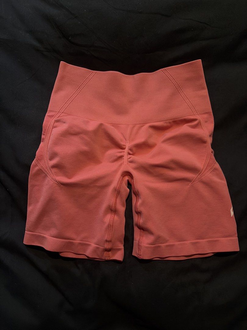 Coral High Waisted Seamless Workout Shorts (Category: Activewear) located in Quezon City. Submitted by shopsoph (Listing ID 1443758895, Image 2). Description: - Vibrant coral color - High-waisted design for a flattering fit - Seamless construction for ultimate comfort - Ruched detail at the back enhances your shape - Stretchy fabric allows for full range of motion - Ideal for running, gym workouts, or casual lounging - RFS: hand me down from my c