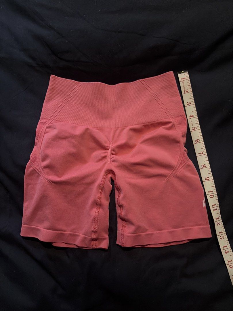 Coral High Waisted Seamless Workout Shorts (Category: Activewear) located in Quezon City. Submitted by shopsoph (Listing ID 1443758895, Image 3). Description: - Vibrant coral color - High-waisted design for a flattering fit - Seamless construction for ultimate comfort - Ruched detail at the back enhances your shape - Stretchy fabric allows for full range of motion - Ideal for running, gym workouts, or casual lounging - RFS: hand me down from my c