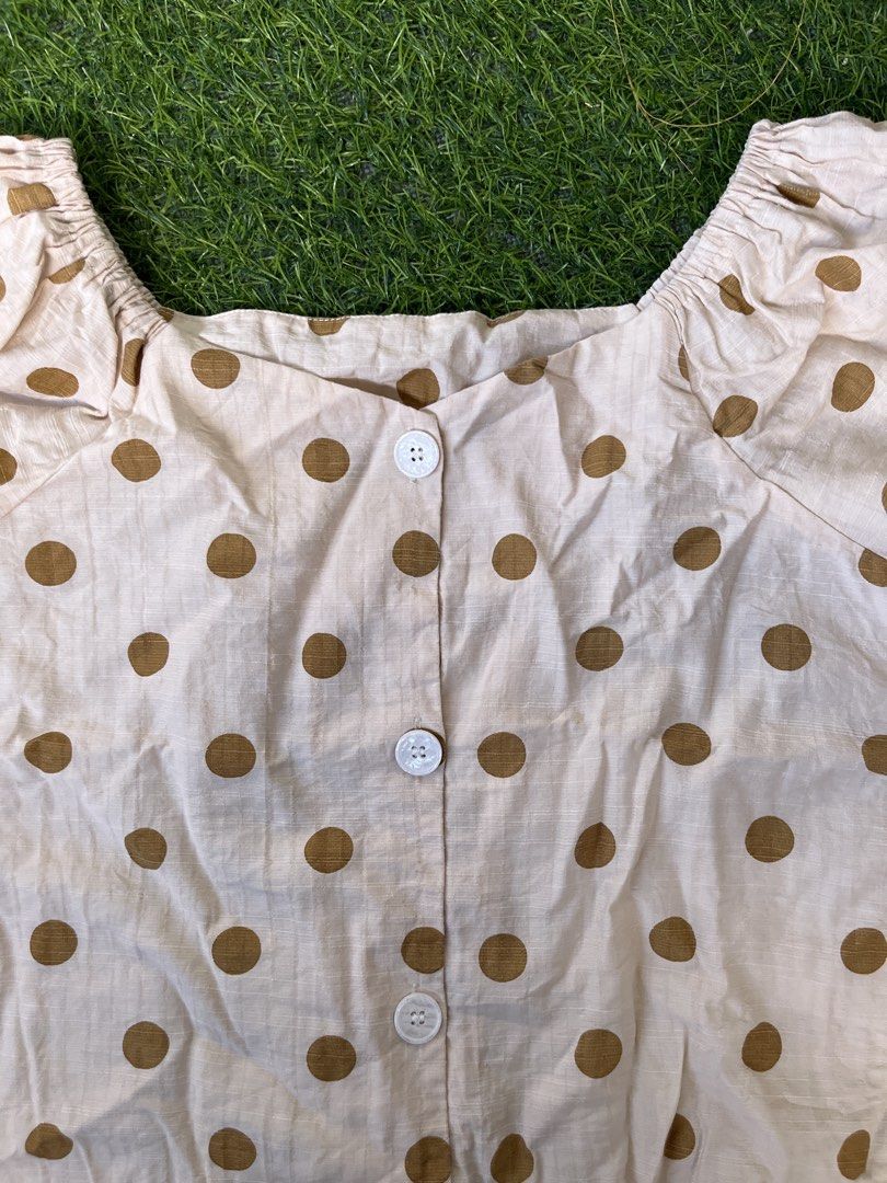 Cream Polka Dot Puff Sleeve LINEN Square Neck Top (Category: Blouses) located in Bacolod City. Submitted by marbiii (Listing ID 1443800520, Image 3). Description: - Cream top with brown polka dots - Square neckline - Puff sleeves - Button-up front - Measurements: Pit to pit approx 20 inches, length approx 21 inches - Lightweight fabric - Ideal for casual wear.