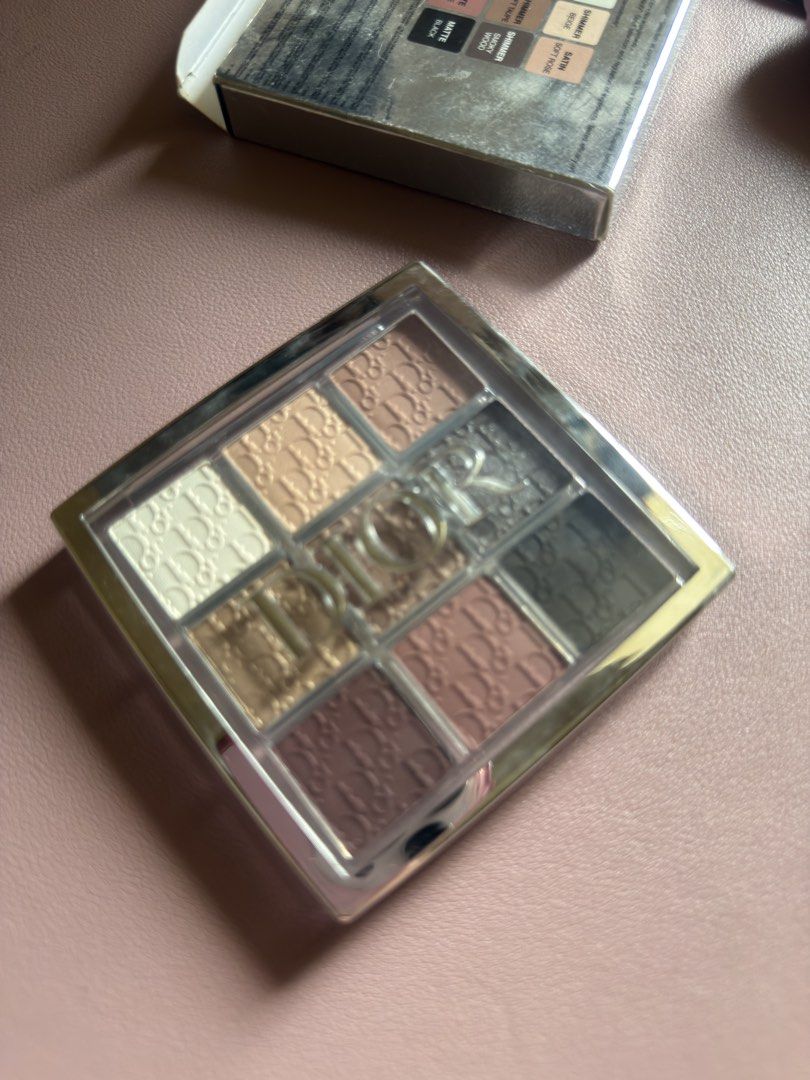 Dior Backstage Eye Palette 002 Smoky Essentials (Category: Makeup) located in Quezon City. Submitted by charmenella (Listing ID 1443756660, Image 3). Description: - Dior Backstage Eye Palette in 002 Smoky Essentials - Features 9 shades with matte, satin, and shimmer finishes - Offers a mix of neutral and smoky tones for versatile eye looks - Comes with original packaging.